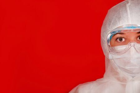 Doctor woman in a protective suit against coronavirus. Medical staff, preventive equipment. Doctor...