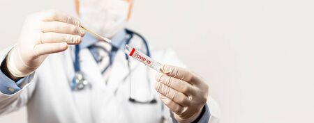 Test for coronavirus Covid-19. Male doctor doing nasal swab laboratoryの写真素材