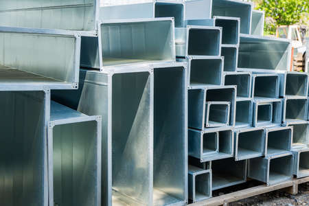 Ventilation pipe warehouse. Steel pipes, parts for the construction of air ducts for an industrial...
