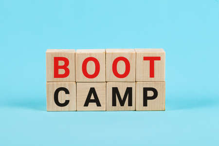 BOOT CAMP word is written on woodblock, business concept Bootcamp word abstract in wood type.の写真素材