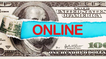 Make money on the Internet online. Dollars with the inscription - online. Finance and business concept.の写真素材