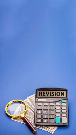 Magnifying glass with the word REVISION. Word writing text Revisの写真素材