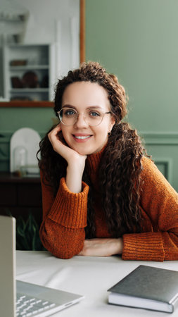 Happy Smiling Young Businesswoman Student Advertising Online Learning and Remote Work from Home Office with Laptop Computers- Portraitの写真素材