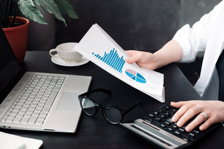 Professional Businesswoman Analyzing Financial Budget and Accounting Data in Office, Calculating...