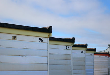 Worthing, West Sussex, England. 11th March 2020. Numbers on the back of beach huts on Worthing beach.のeditorial素材