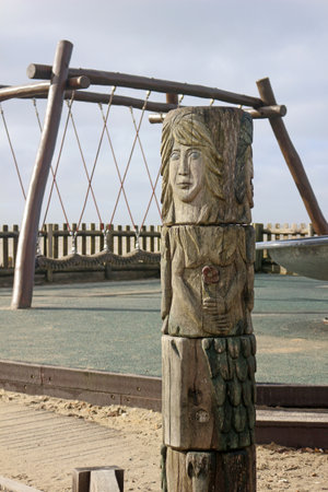 Worthing, West Sussex, England. 11th March 2020. A wooden mermaid stands in the Waterwise play area in Worthing.のeditorial素材