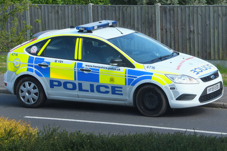 Portsmouth, Hampshire, England. 9th June 2013. A Hampshire constabulary police car parked on a curb.