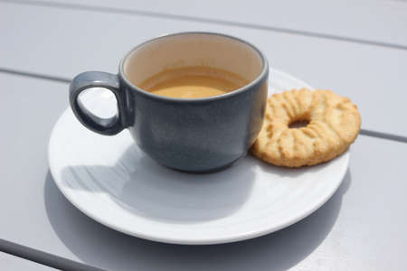 cup of coffee and biscuit