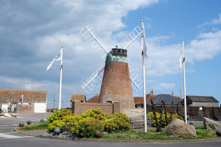 Medmerry mill at the entrance to West Sands Seal Bay resortの写真素材