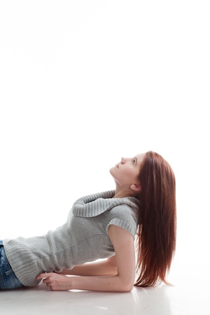 girl on a white background and is looking upの写真素材