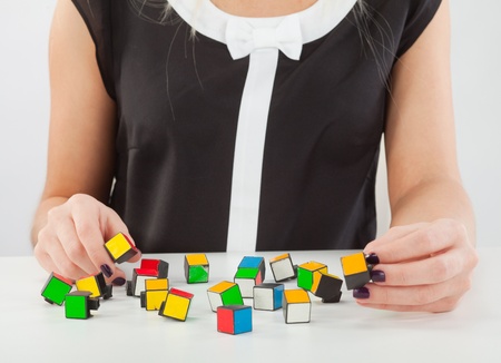 Manager sits in front of a puzzle as it is thought to collectの写真素材