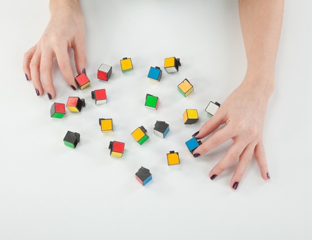 female hands with cubes of the puzzleのeditorial素材
