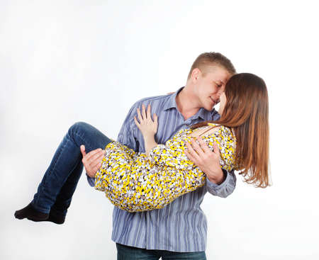 man is a girl in his armsの写真素材