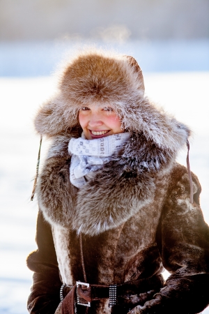 portrait of female face covered in snow iceの写真素材