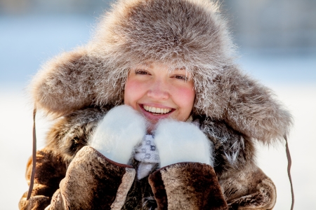 Close-up portrait of female face covered in snow iceの写真素材