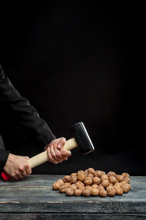 solve the problem of how to crack a walnutの写真素材