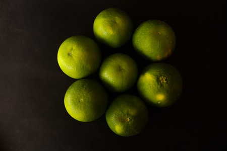 Slice of Mosambi over white background, Sweet Lemon isolated on black background
