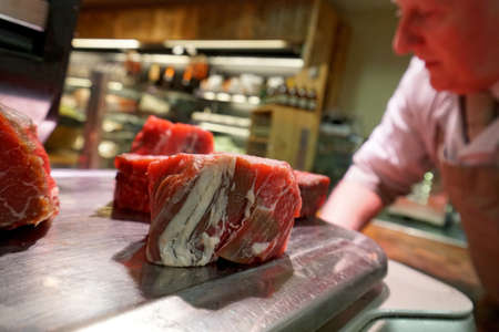 meat weighing in Higgins family butcher state of the art food store in Suttonのeditorial素材