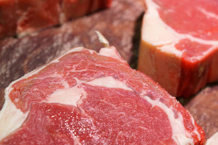 Sutton Dublin - 11/09/2019: Higgins family butcher, close up of rib eye on the chopping boardのeditorial素材