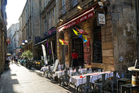Bordeaux - 08/27/2020: waiter waiting for guest in old streetのeditorial素材