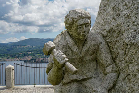Alzo di Pella - Lake Orta - 07/12/2020 - stonemason stuatue detail, Italyのeditorial素材