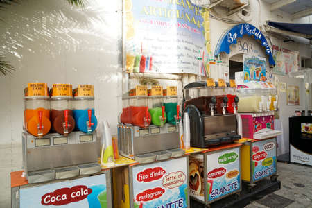 Peschici - 29/06/2021: famous italian ice cream shop with people in Peschici at night, Puglia, Italyのeditorial素材