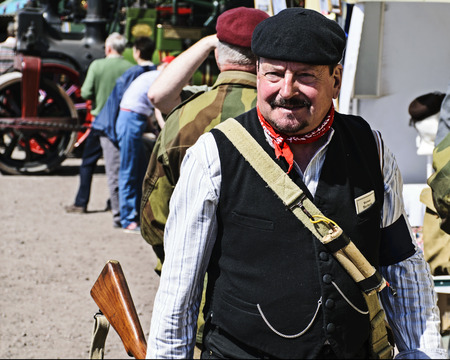 UK, LEICESTERSHIRE  - JUNE 2015:  Man dressed in style of French resistance fighter at Victory Day...