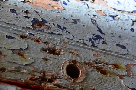 Essaouria, Morocco - September 2017: Blue Flaking paint on a door missing its handleのeditorial素材