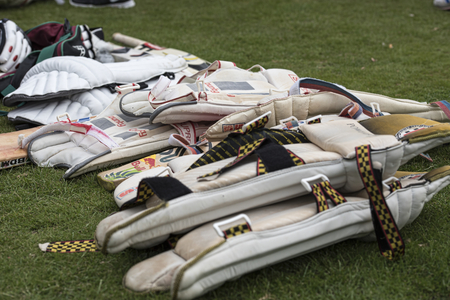 LOUGHBOROUGH, UK - July 2017 - cricket equipment piled up ready for use at a local charity cricket matchのeditorial素材