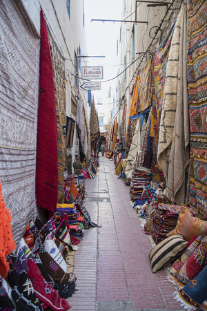 Essaouria, Morocco - September 2017: carpet lined walls of an alley in the medinaのeditorial素材