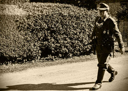 UK, Rothley - June 2018: Man wearing German wartime uniform - sepiaのeditorial素材