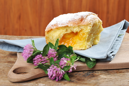 Baked donut   yeast with apricot jamの写真素材