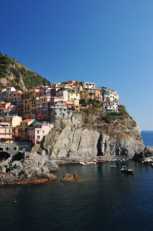 Manarola town of Cinque Terre National Park at calm sunny day, Italy 