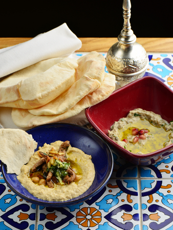 Baba ganoush and Hummus, arabian appetizer from tahini and baked eggplant, excellent dip for meat or...