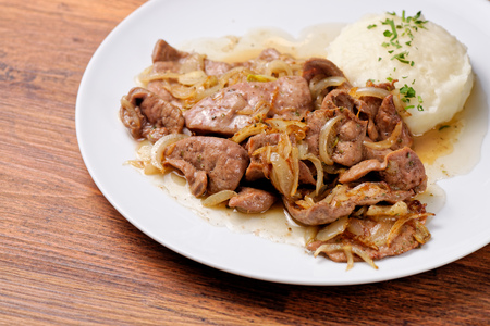 Liver and onions with potatoの写真素材