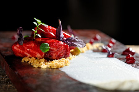 Tuna sashimi, tuna tartare and beetroot sauce. Haute cuisine
