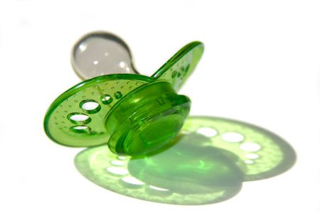 plastic pacifier on white backgroundの写真素材
