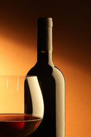 Bottle and glass of red wineの写真素材