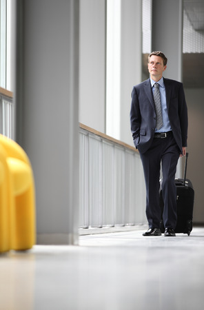 businessman travel with trolleyの写真素材