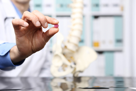 doctor hand with pill, healthcare and medical concept.の写真素材