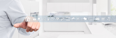smart home automation control hand touch screen with white background.の写真素材