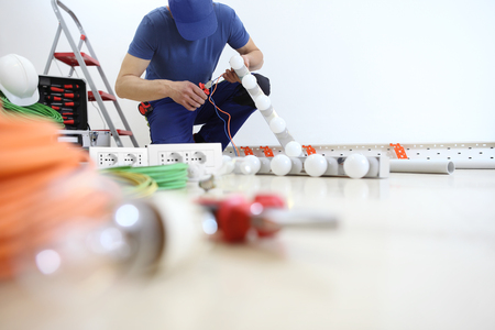 installing electric circuits, installing electrical circuits,の写真素材