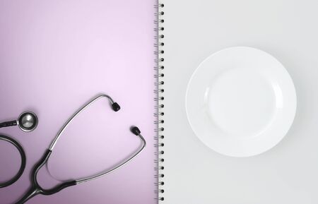 concept of medical food and diet, empty notebook on white, copy space blank template.の写真素材