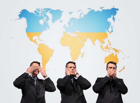 War in Ukraine indifference, indifferent businessman isolated on the world map whit yellow and blue...