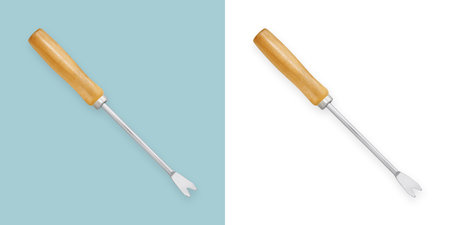 Garden weed removal hand tool with wooden handle. Top view isolated on white background. Gardening equipment for deeper digging and removing invasive weeds, planting, potting and weeding.の写真素材