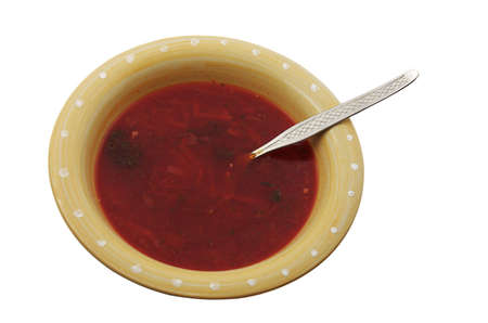 Beet soup in the plate with spoonの写真素材