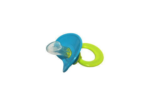 blue and green babys dummy isolated over white