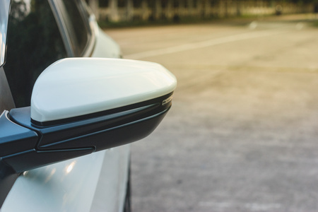 Rear view mirror on a modern white car.の写真素材