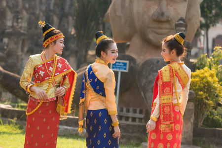 Beautiful girl in Laos costume,Asian woman wearing traditional Laos culture at temple.Vintage style.の写真素材