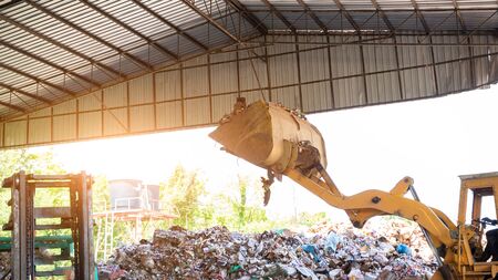 Loaders work in waste recycling plants,Industry concept.
